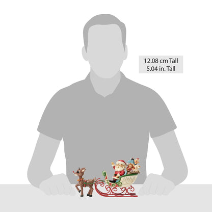 Rudolph Pulling Santa in Sled